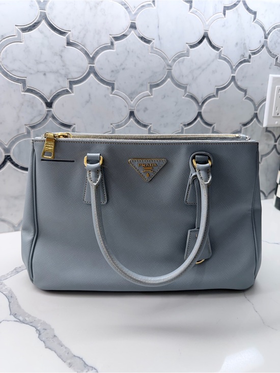 Prada Handbags - Prada Light Blue Saffiano Leather Tote with Gold Hardware
